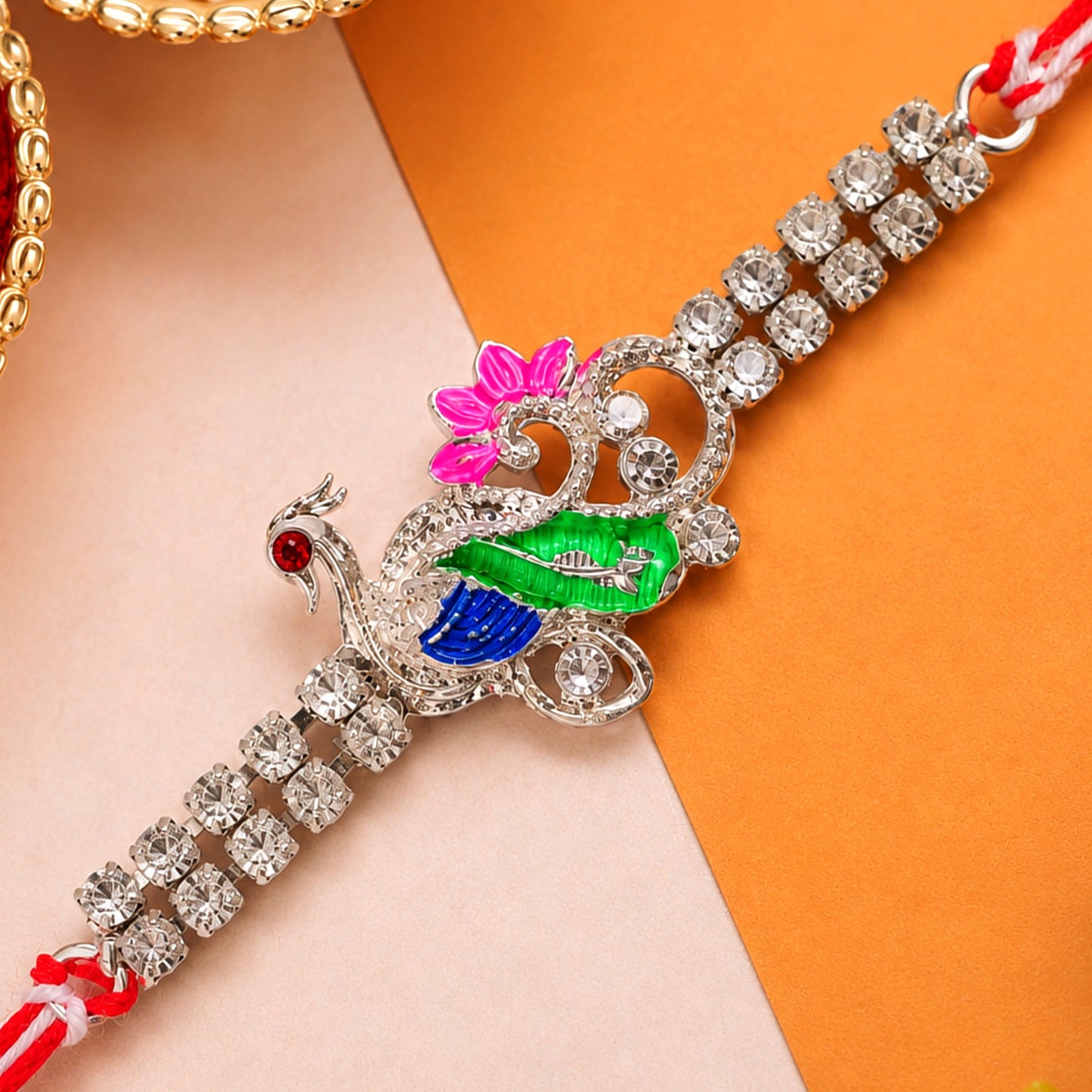 Classic Rakhi with Peacock Swirl Charm, crystal sparkle and thread look for Gifting