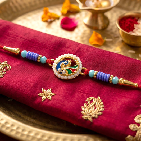 Lovely peacock pearl centerpiece on rakhi