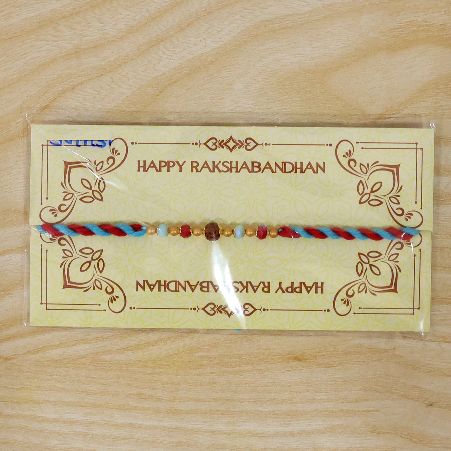 Beautiful Multicolor Designer Rakhi with Golden Centre and Cheerful Raksha Bandhan Style