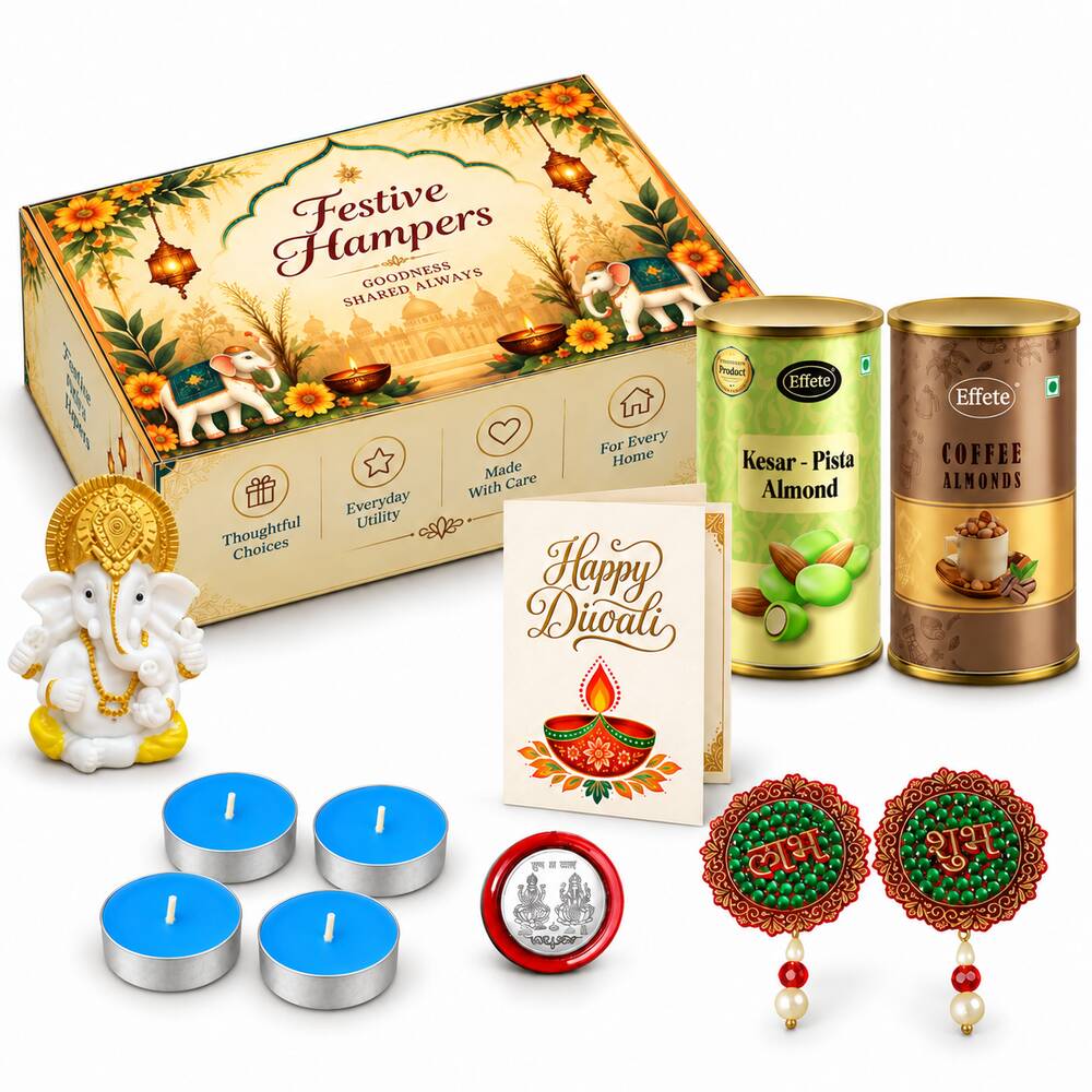 A festive hamper box, Ganesha idol, four blue tealights, Diwali card, two almond tins, and two decorative hangings with a