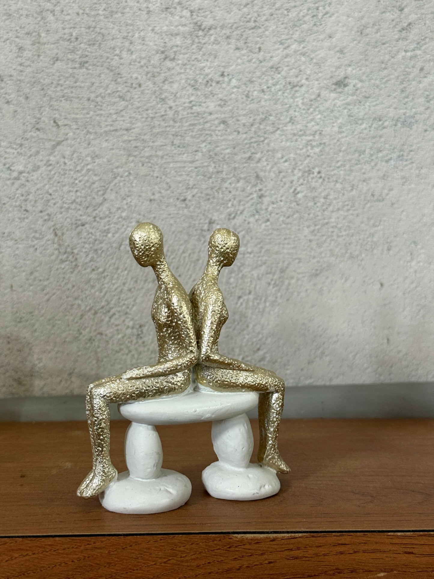 Abstract Golden Couple Sitting Figurine Showpiece for Home Decor & Gifting