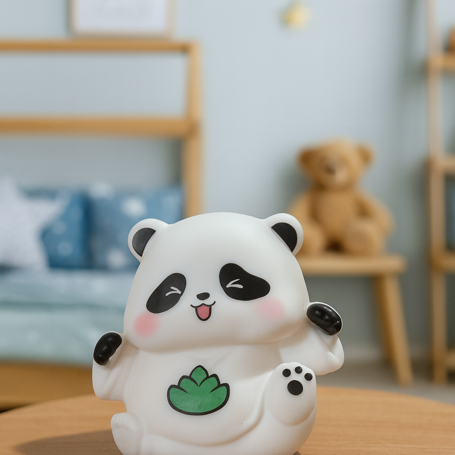 Cute smiling mini panda figurine on white background