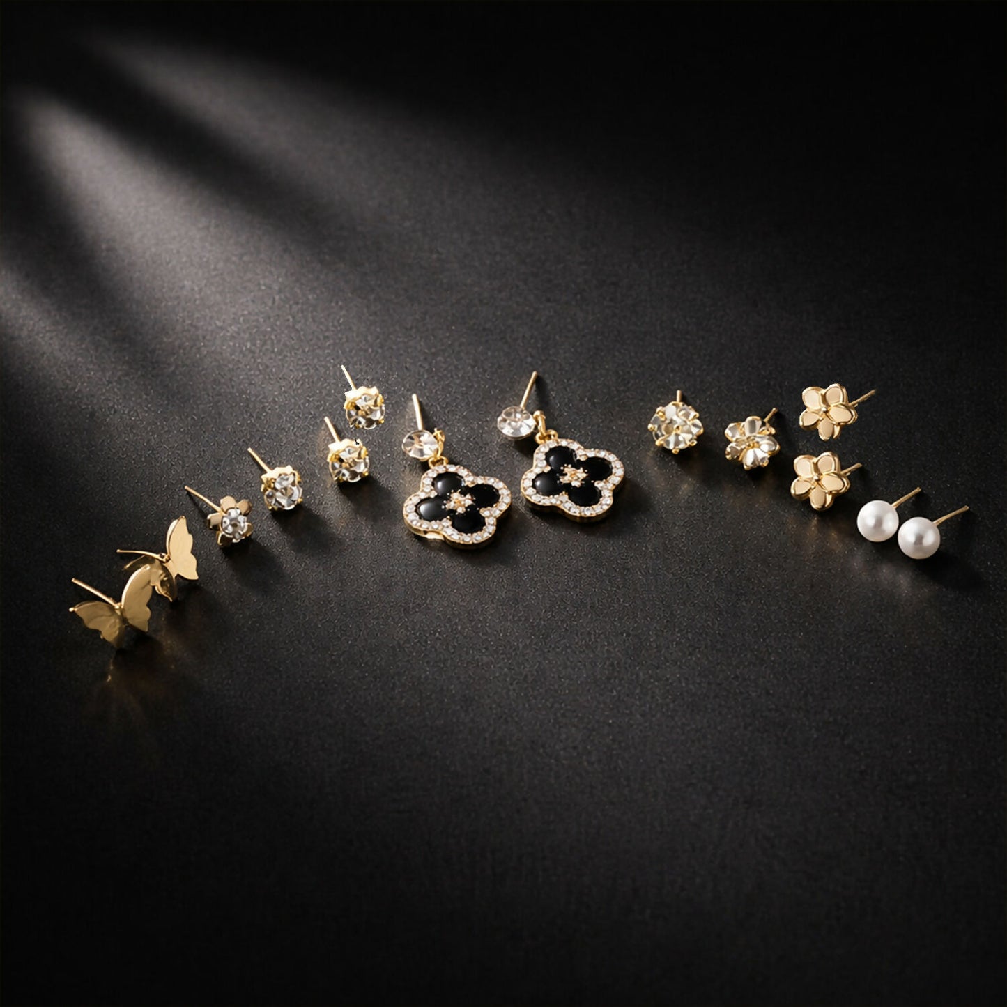 Black floral drop earrings included in the elegant gold and black combo set