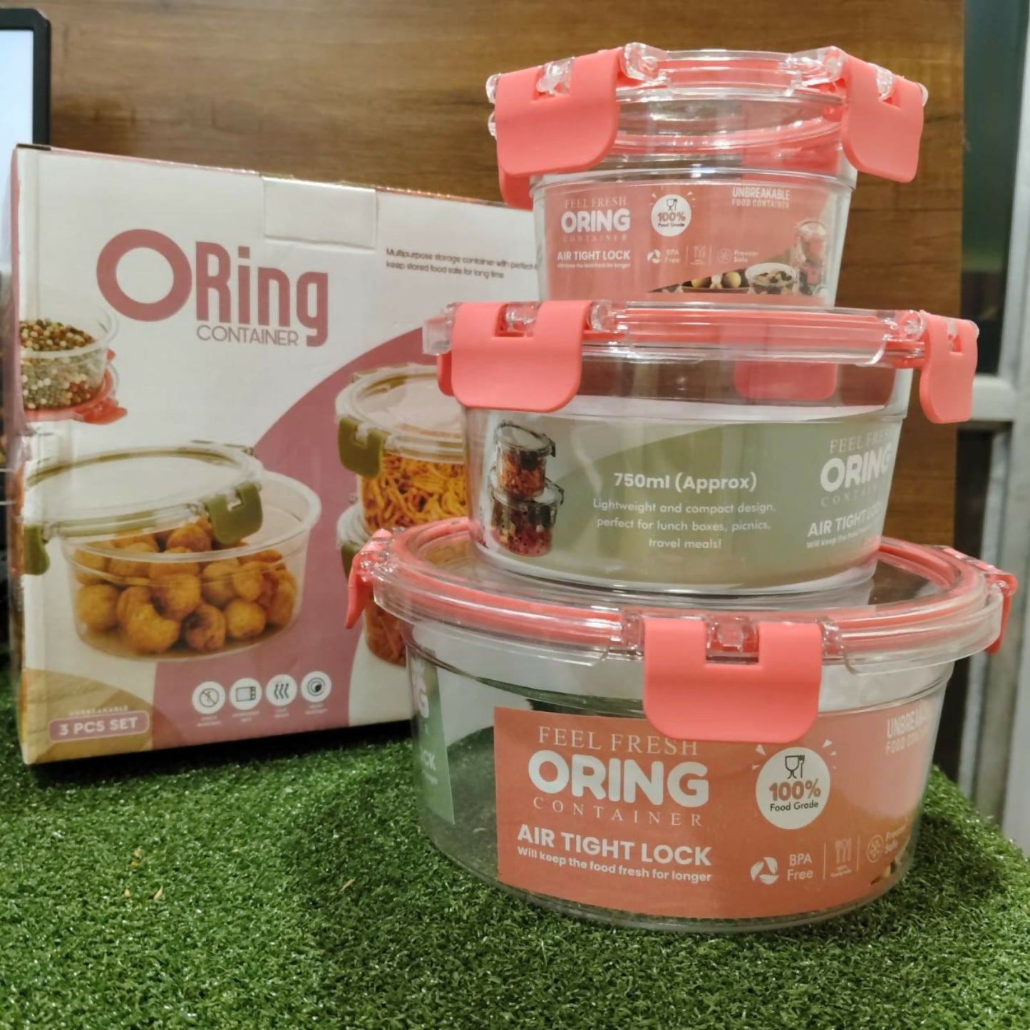 Transparent Oring food containers stacked, showing contents clearly