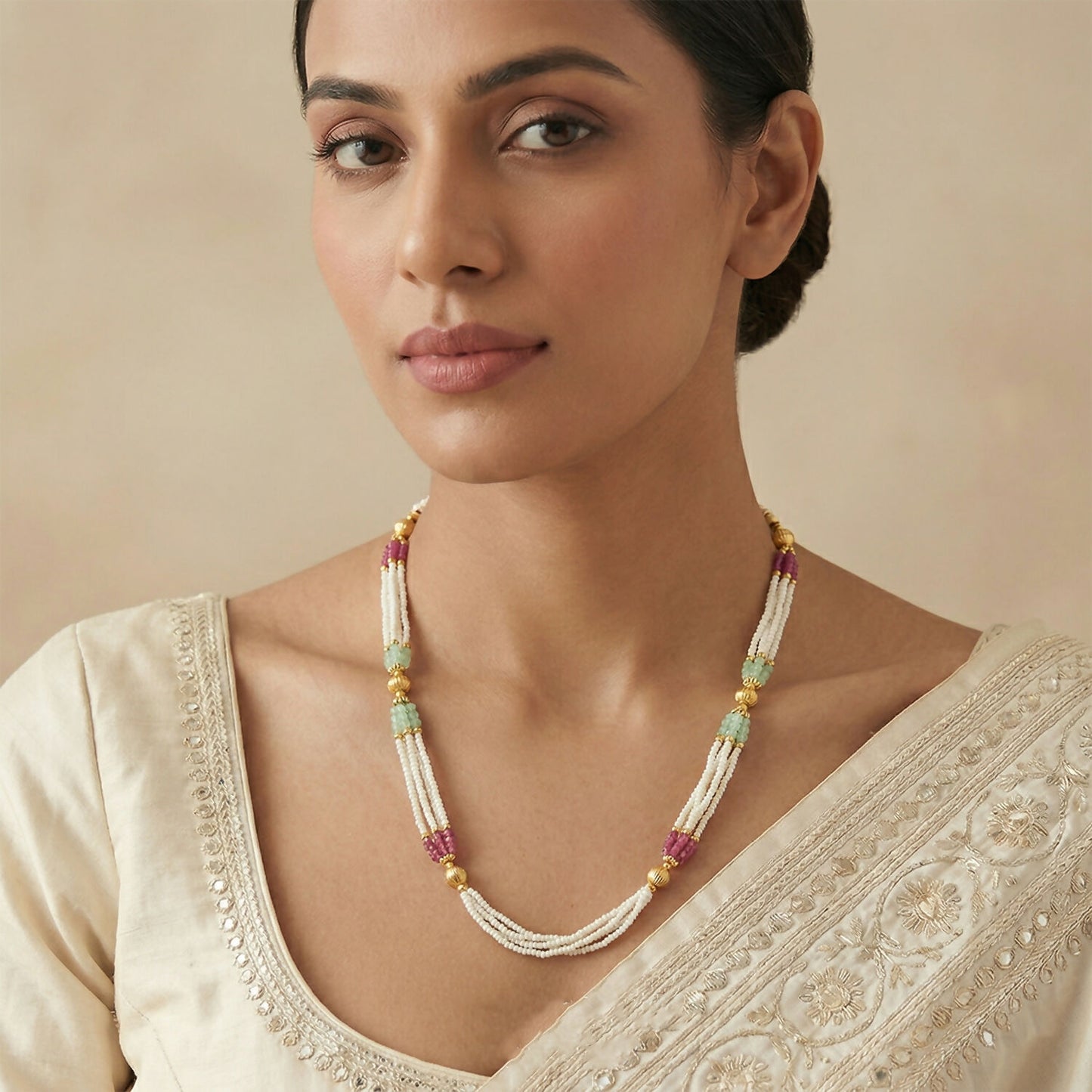 Layered pearl bead strands forming elegant mala necklace