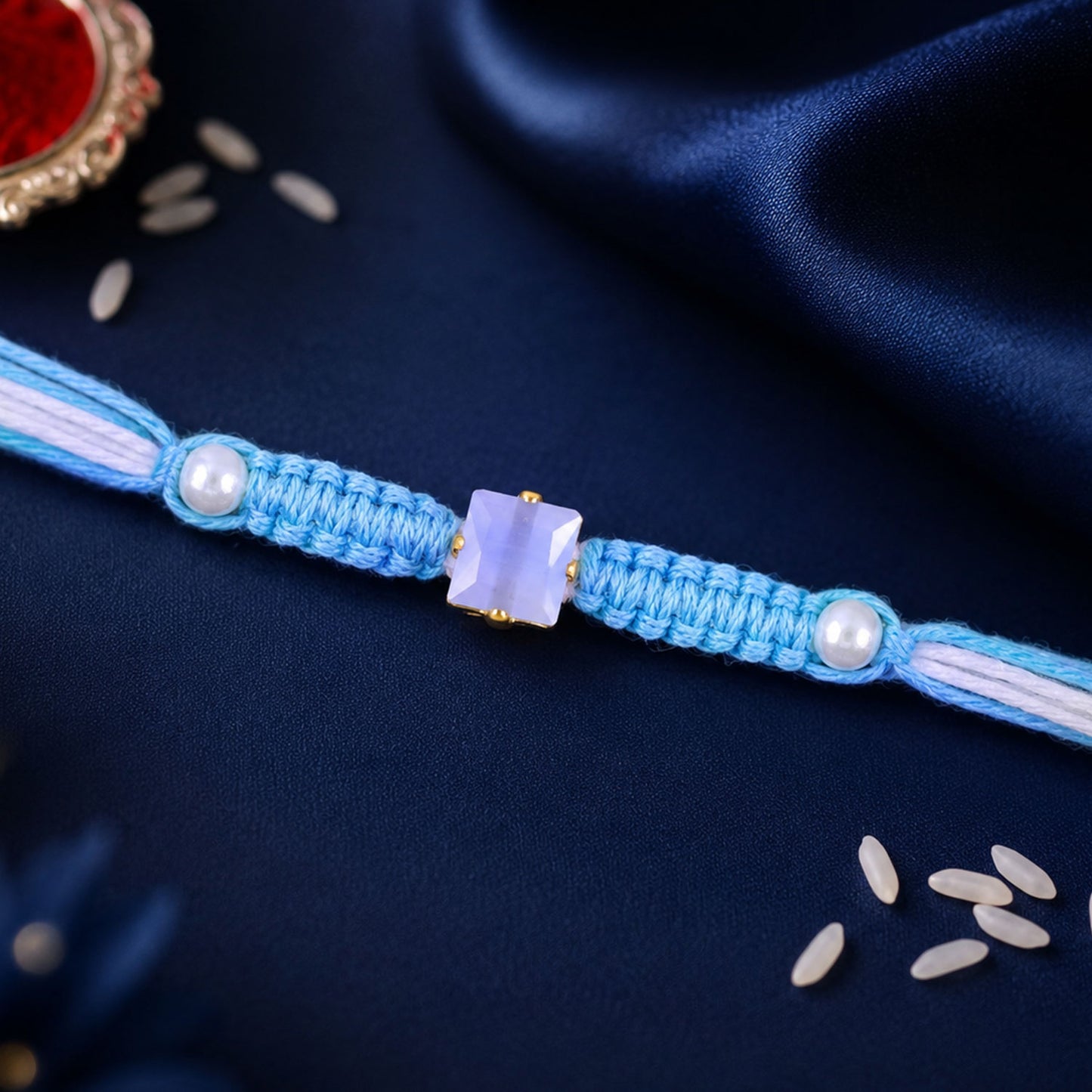 Blue Square Stone Macrame Rakhi with Pearl Beads, Silver Accents and Soft Thread