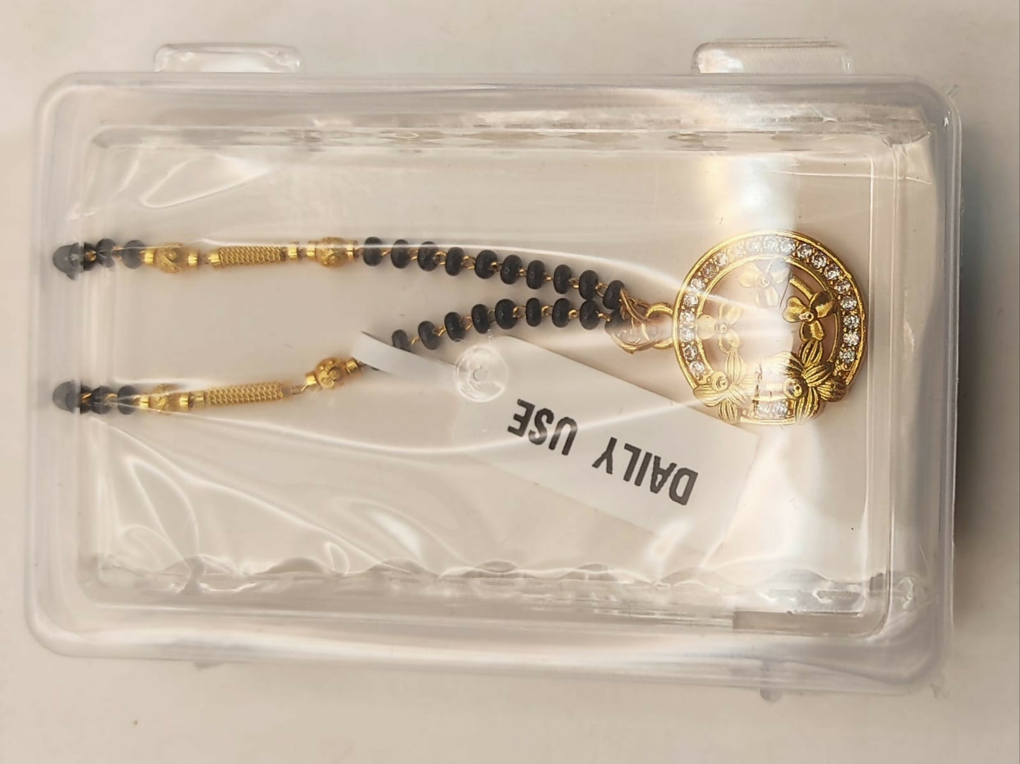 Gold-Plated AD Floral Circle Mangal sutra with Black Beads For women