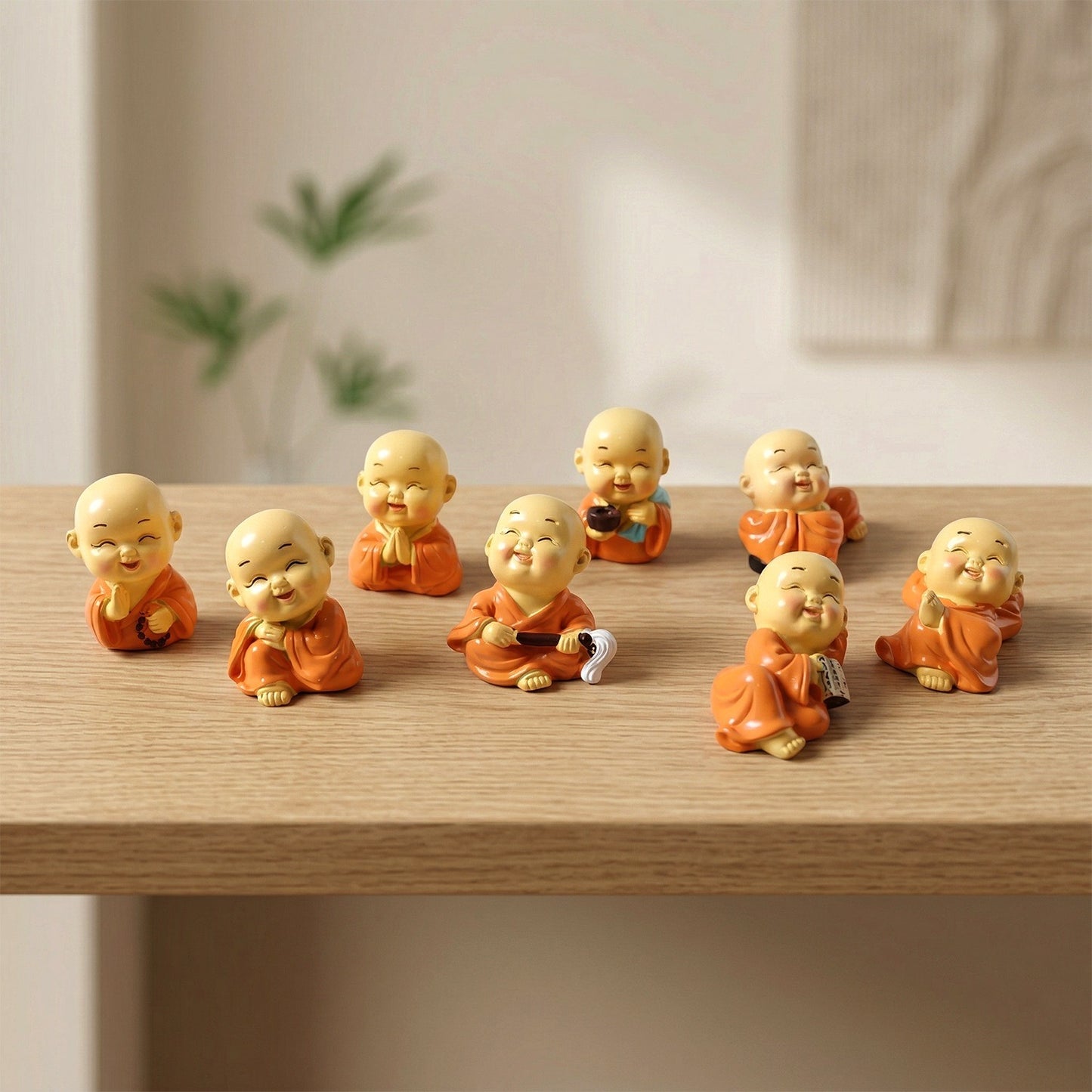 Mini Monk Buddha statue set with joyful expressions
