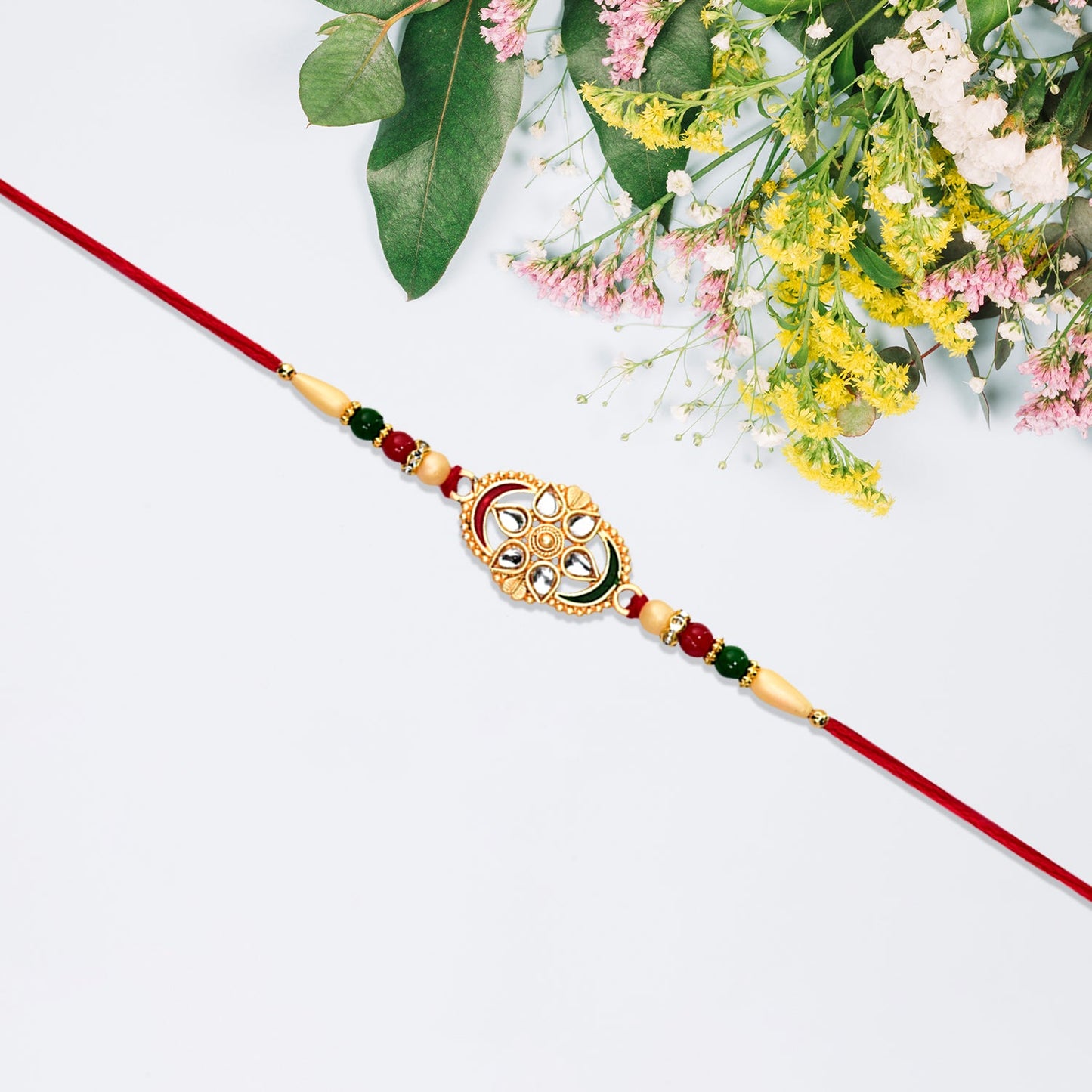 Flower Design Rakhi with Red and Green Beads Festive Elegance (5pcs)