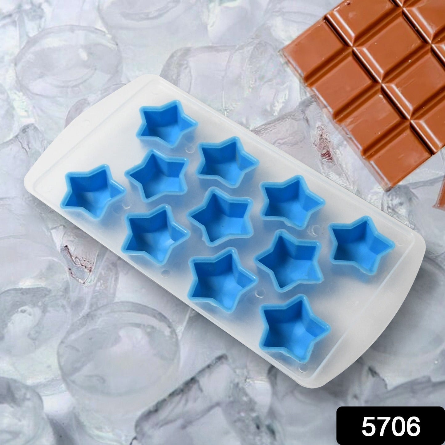 Close-up of a flexible silicone mold creating multi-fruit shaped ice cubes.