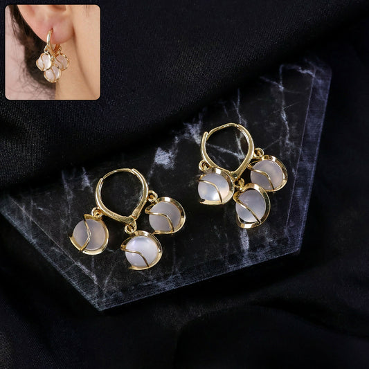 Gold-plated hoop earrings with opal stone clusters
