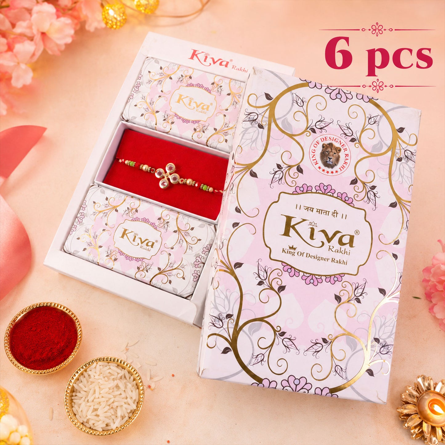 Four Crystal Clover Rakhi with Gold Bezels, Roli Chawal Coin and Floral Gift Packing
