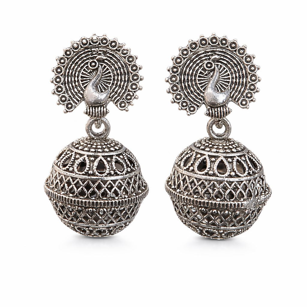 Close-up of oxidised silver jhumka earrings highlighting intricate detailing