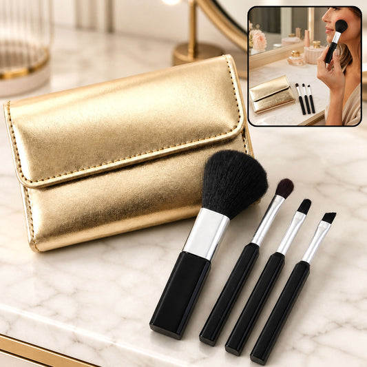 A gold makeup brush pouch and four black and silver brushes on a marble surface, with a woman applying makeup in an inset.