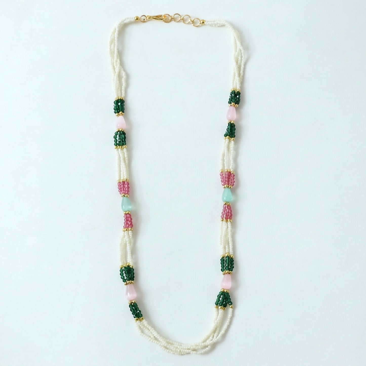 Festive style pearl necklace with green and pink stones