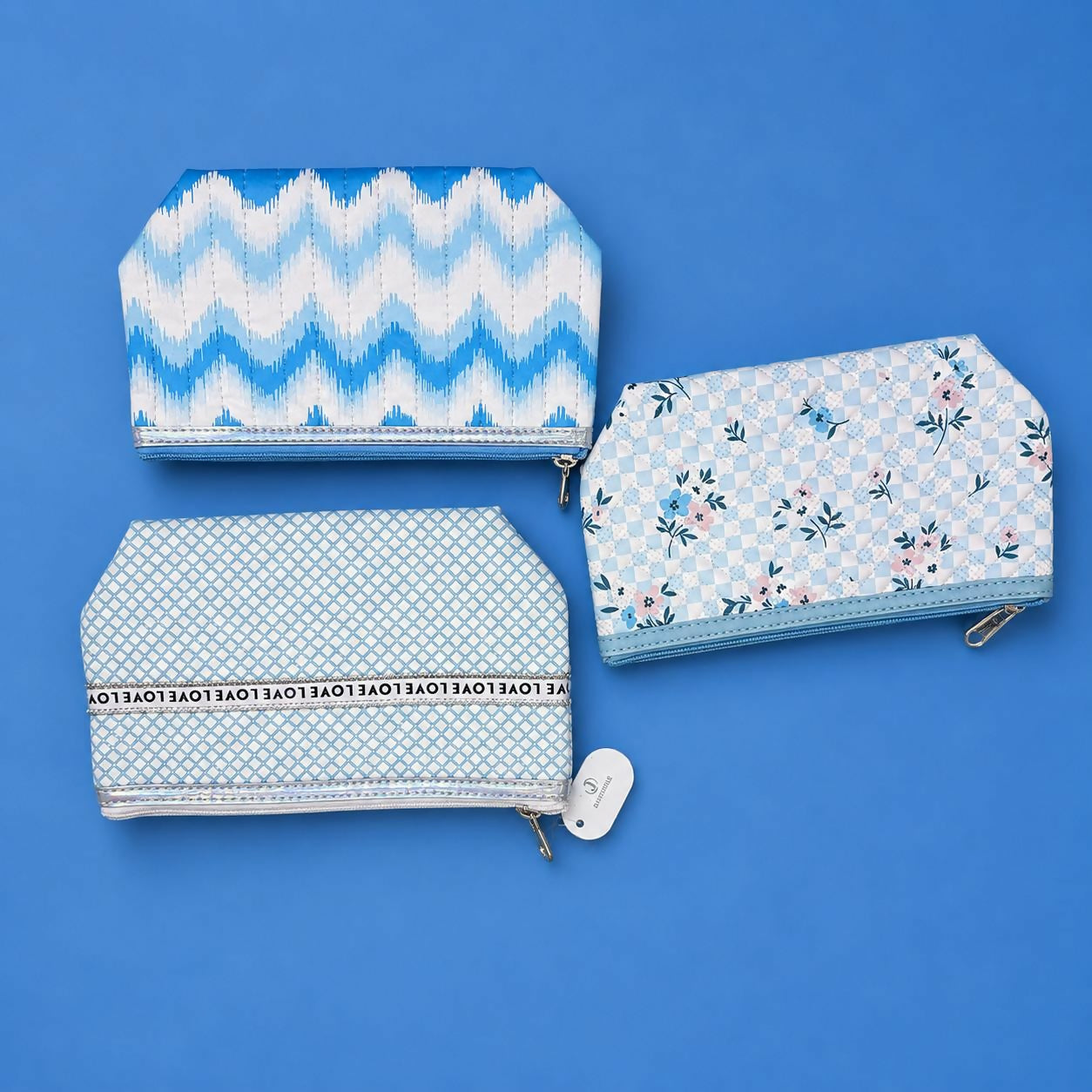 Stylish quilted blue pouch with floral pattern