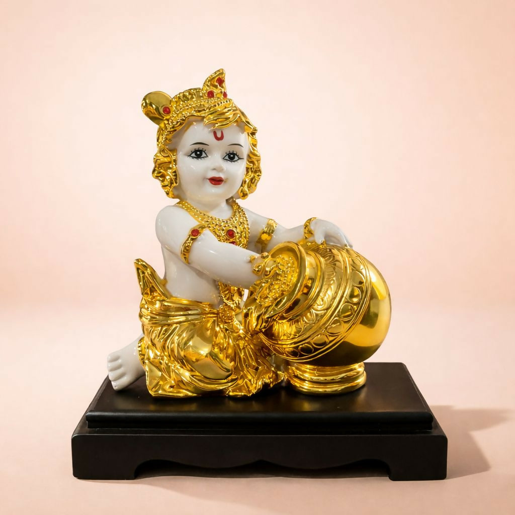 Golden Bal Krishna idol showing detailed craftsmanship