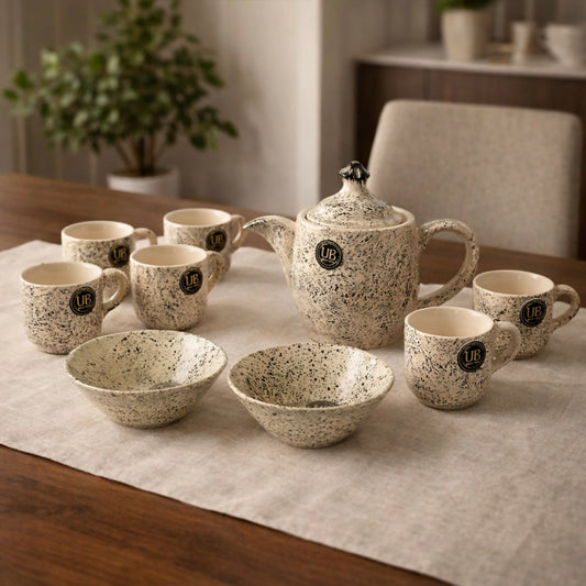 Elegant 9-piece ceramic tea set with teapot and cups