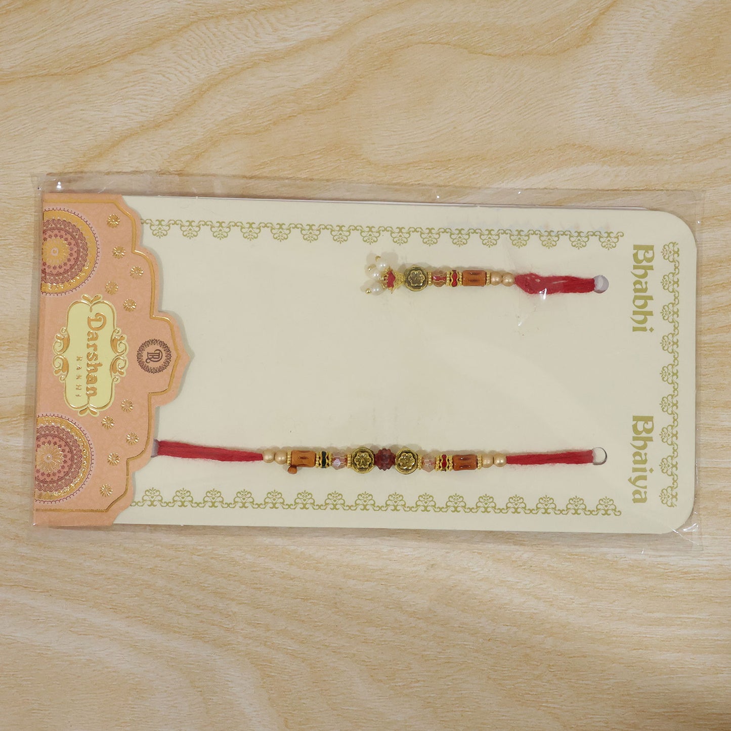 Graceful Beaded Minimal Design Bhai Bhabhi Rakhi with Beads and Charm for Gifting
