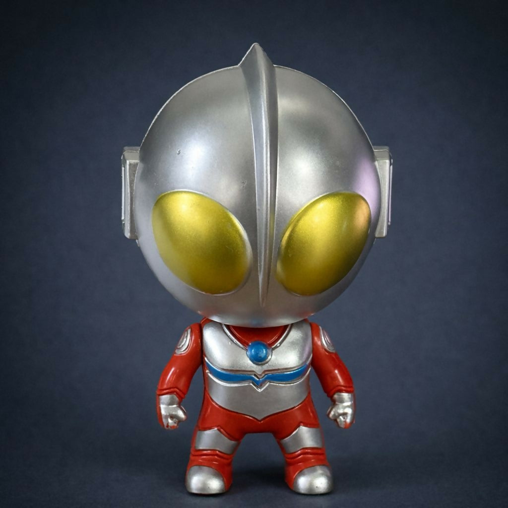 Opening superhero surprise capsule toy revealing mini figure