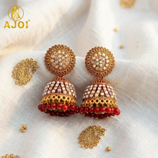 Elegant Gold-Plated Pearl Jhumka Earrings with Red Bead Drops