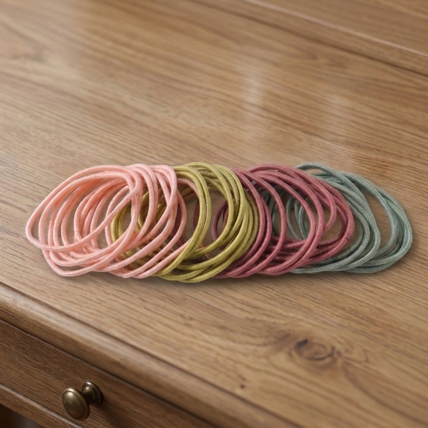 Collection of elastic hair bands in neutral shades