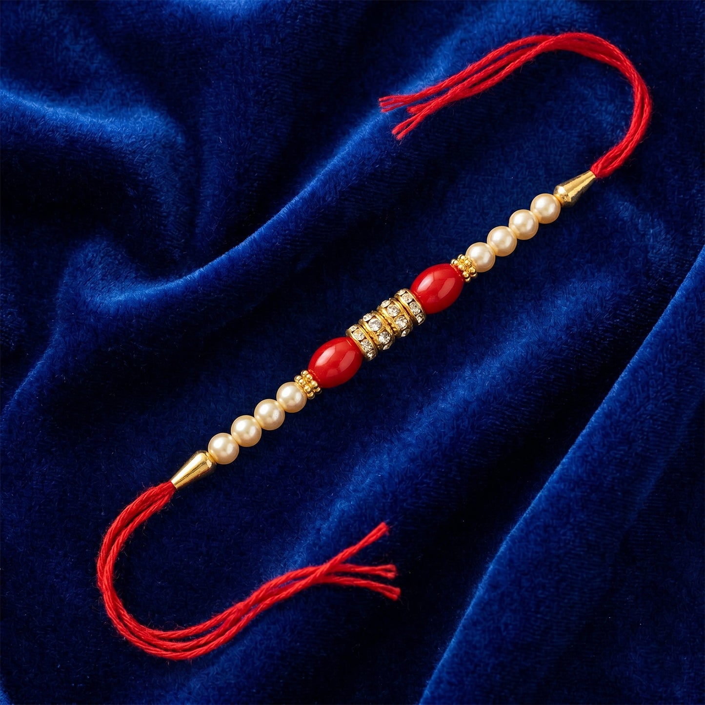Red Moti Rakhi with Pearl Line and Antique Gold Spacer Beads