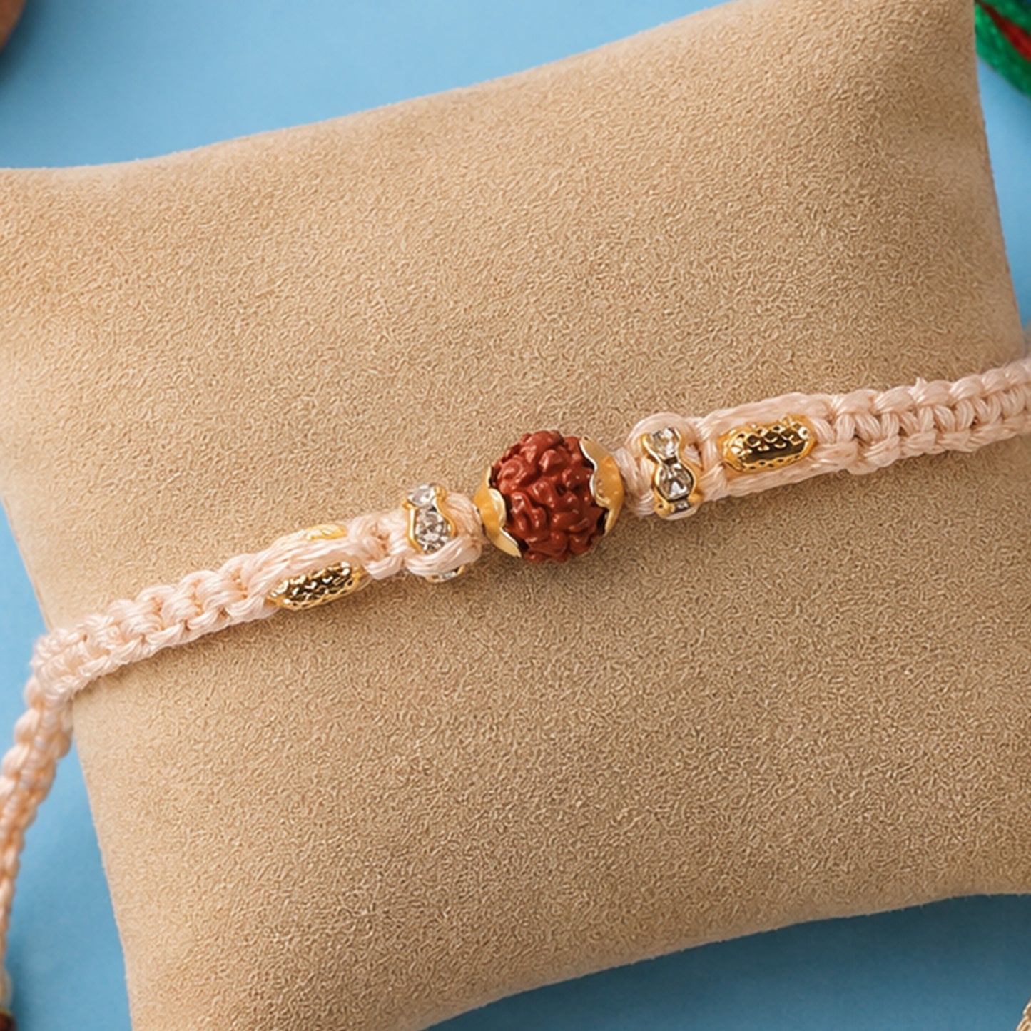 Beautiful Silver Style Rakhi with Soft Beads, Stone Detail and Premium Festive Look