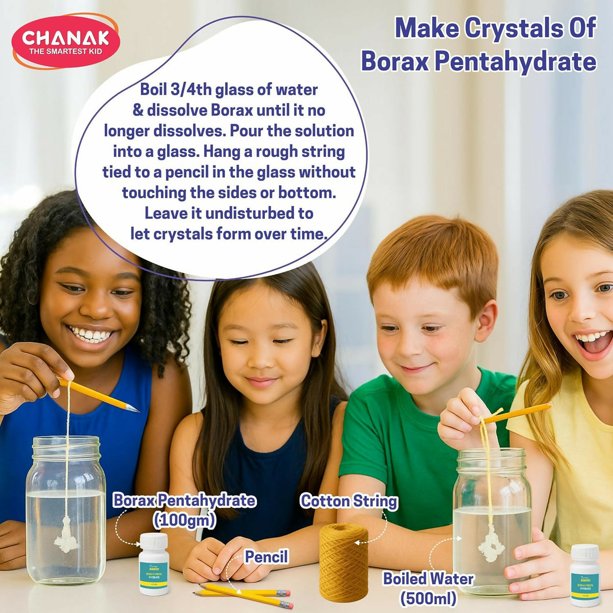 Four children happily observe strings with crystals forming in clear jars, holding pencils and surrounded by borax, cotton
