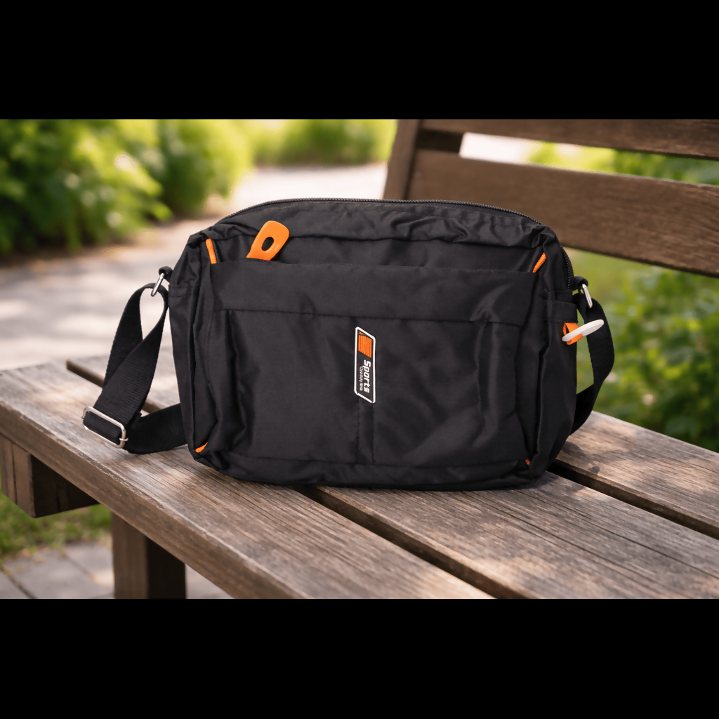 Multiple zipped compartments on sporty crossbody bag with reinforced strap for secure carry