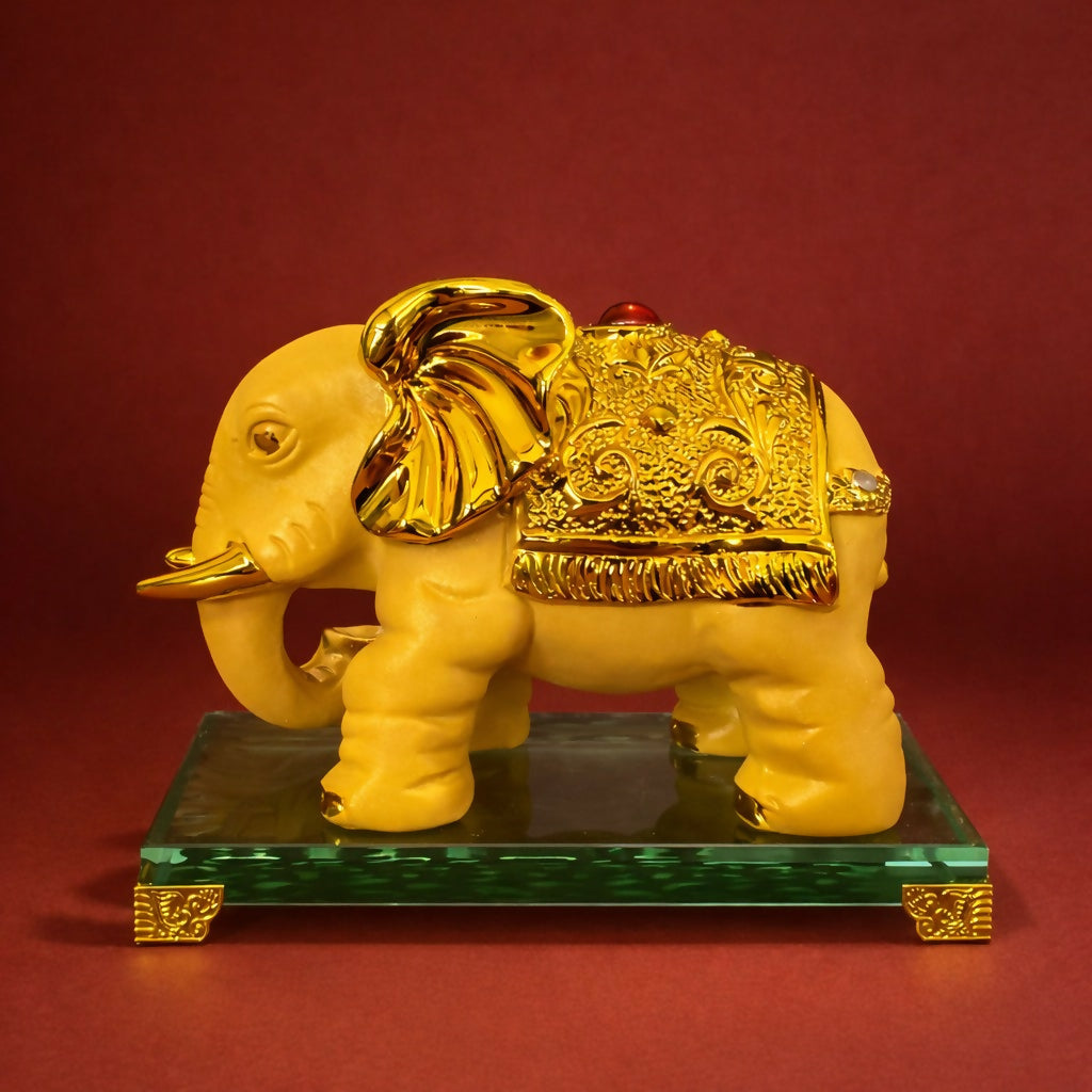 Close-up of detailed golden elephant sculpture for table decoration