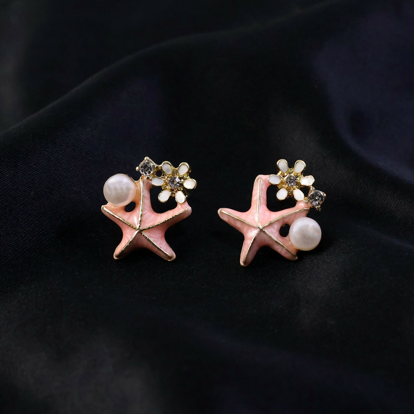 Pink enamel and crystal floral detailing on earrings
