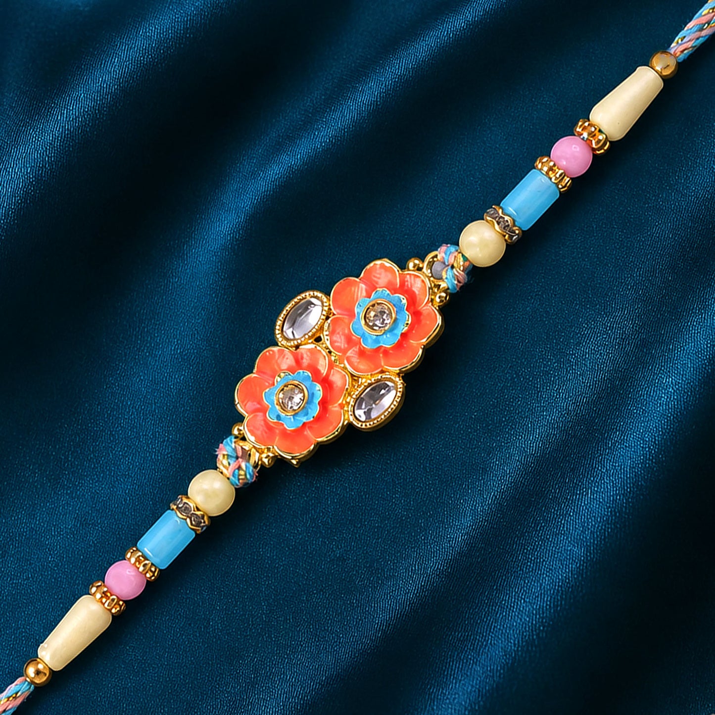 Ornate Rakhi with Butterfly Bloom Charm, multicolor stones and bead line for Gift Use