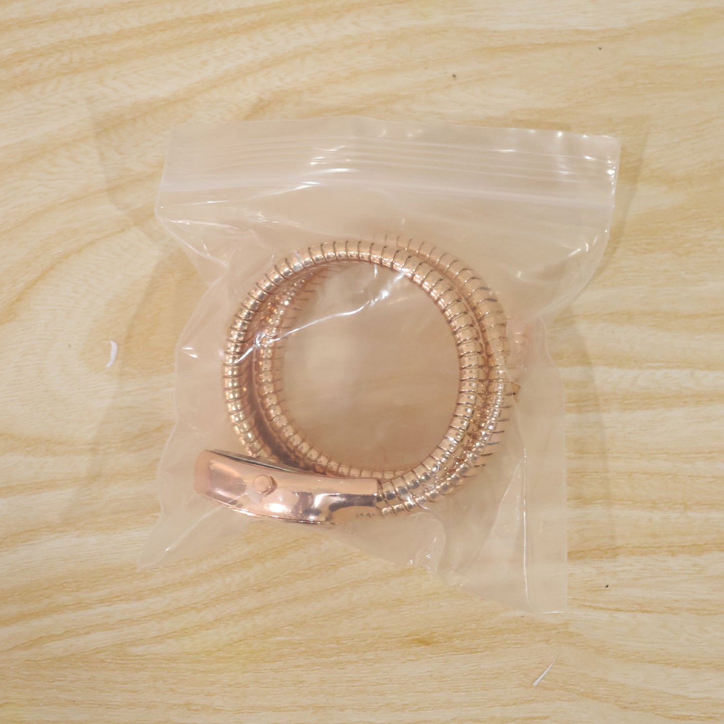 Rose Gold Oval Snake Style Bracelet Watch with Crystal Dial Border Design