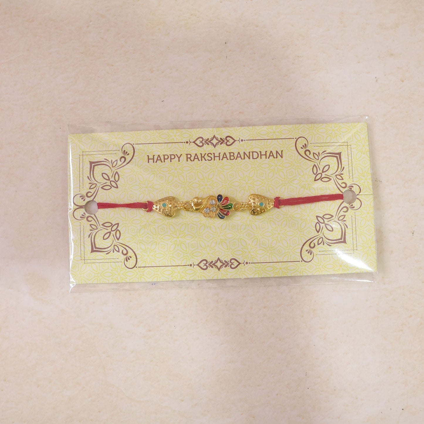 Gold-Toned Peacock Rakhi with Colorful Enamel and Stones for Raksha Bandhan (5pcs)