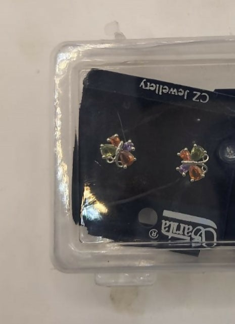 Side view of silver-plated butterfly zircon stud earrings showing secure backing for comfortable wear