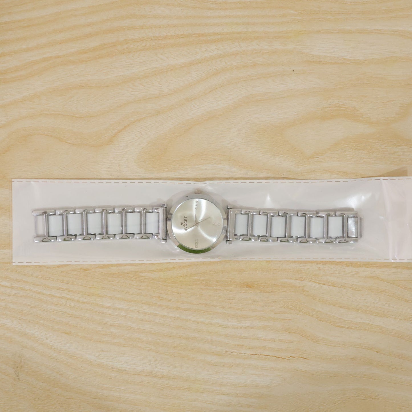Silver Round Shape Dial Watch with White Metal Strap Design for Women