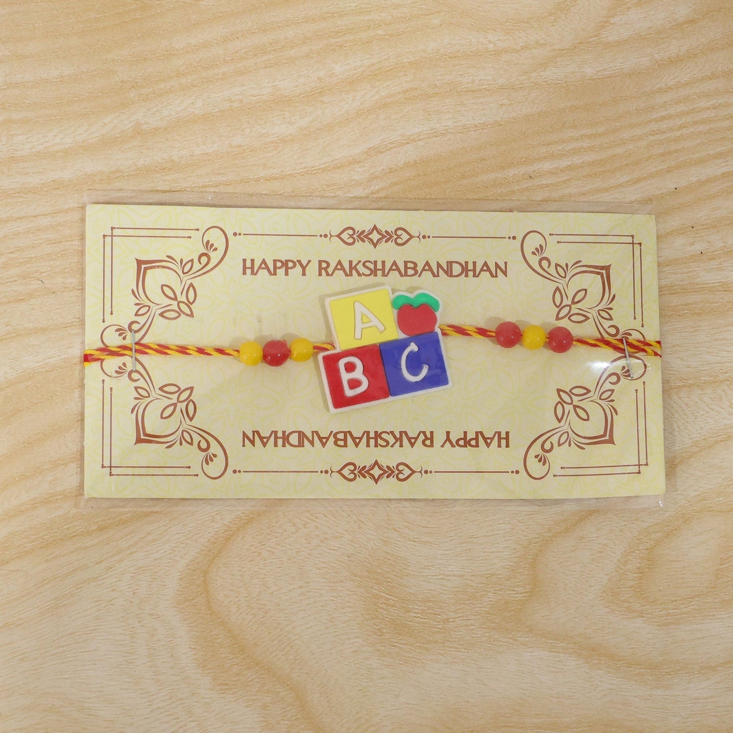 Kids Beaded Rakhi for Brother - Alphabet Blocks Cartoon Design (5pcs)