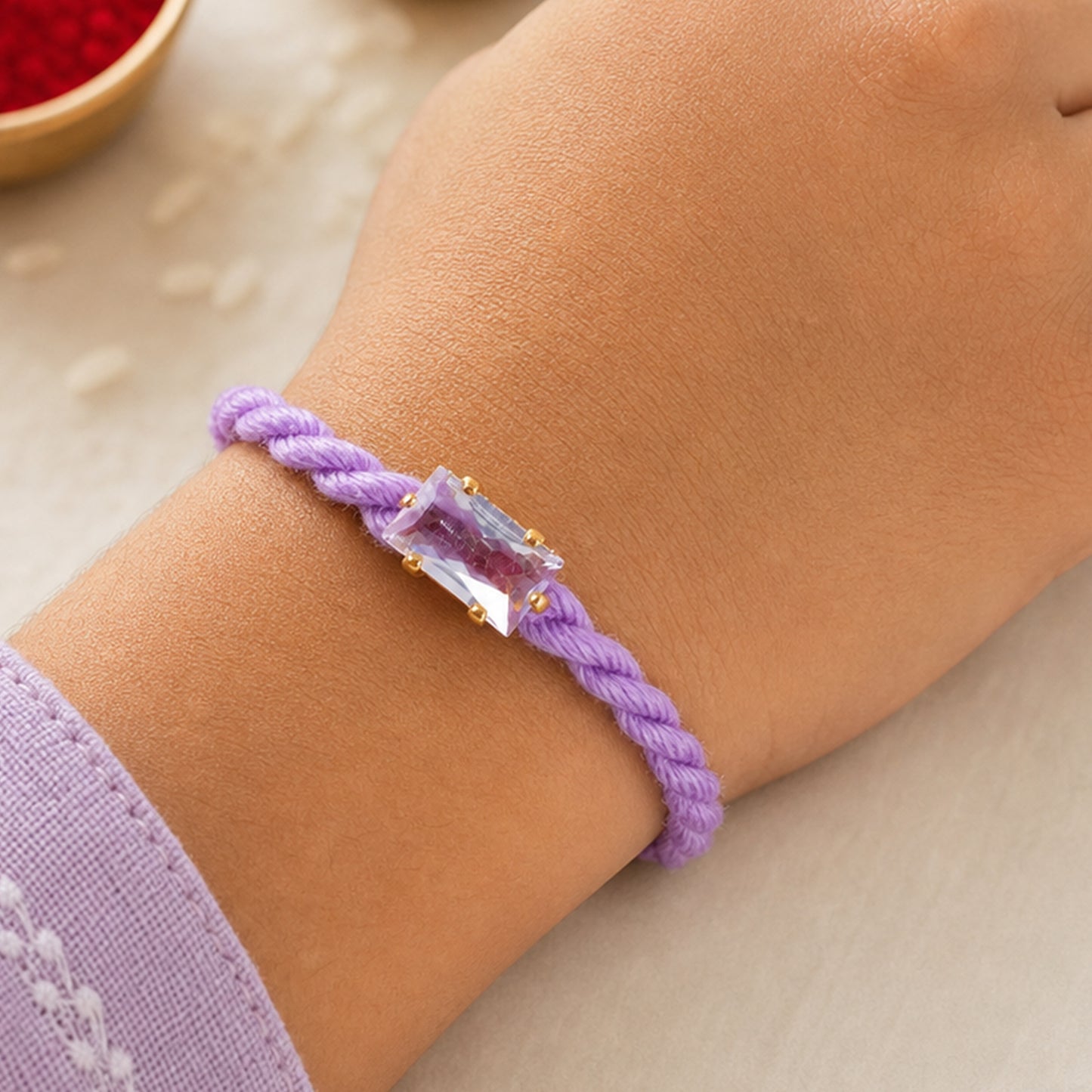 Purple Twisted Cord Rakhi with Rectangular Crystal Stone Pendant