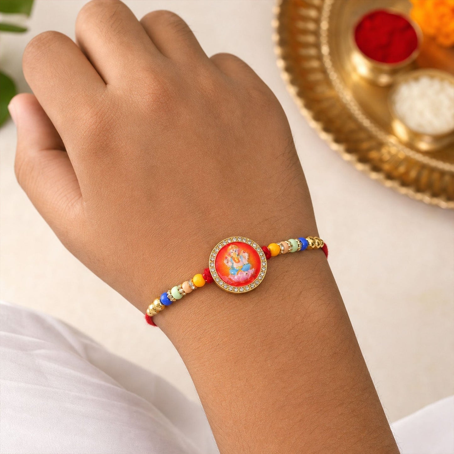 Ganesha Rakhi for Brother Golden Motif with Stones & Beads (5pcs)