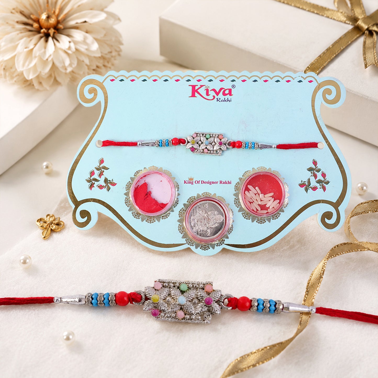 Rectangular Pearl Crystal Rakhi with Red Blue Beads, Roli Chawal Coin and Gift Packing