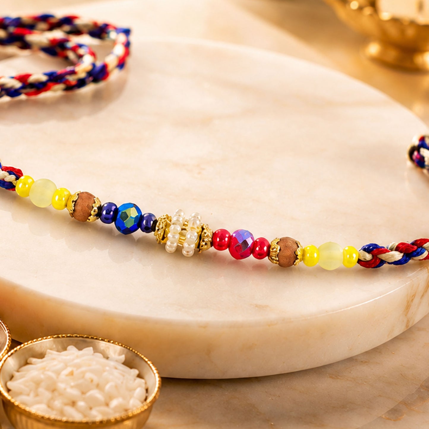 Rainbow Beaded Charm Rakhi with Colorful Festive Style and Playful Bracelet Look