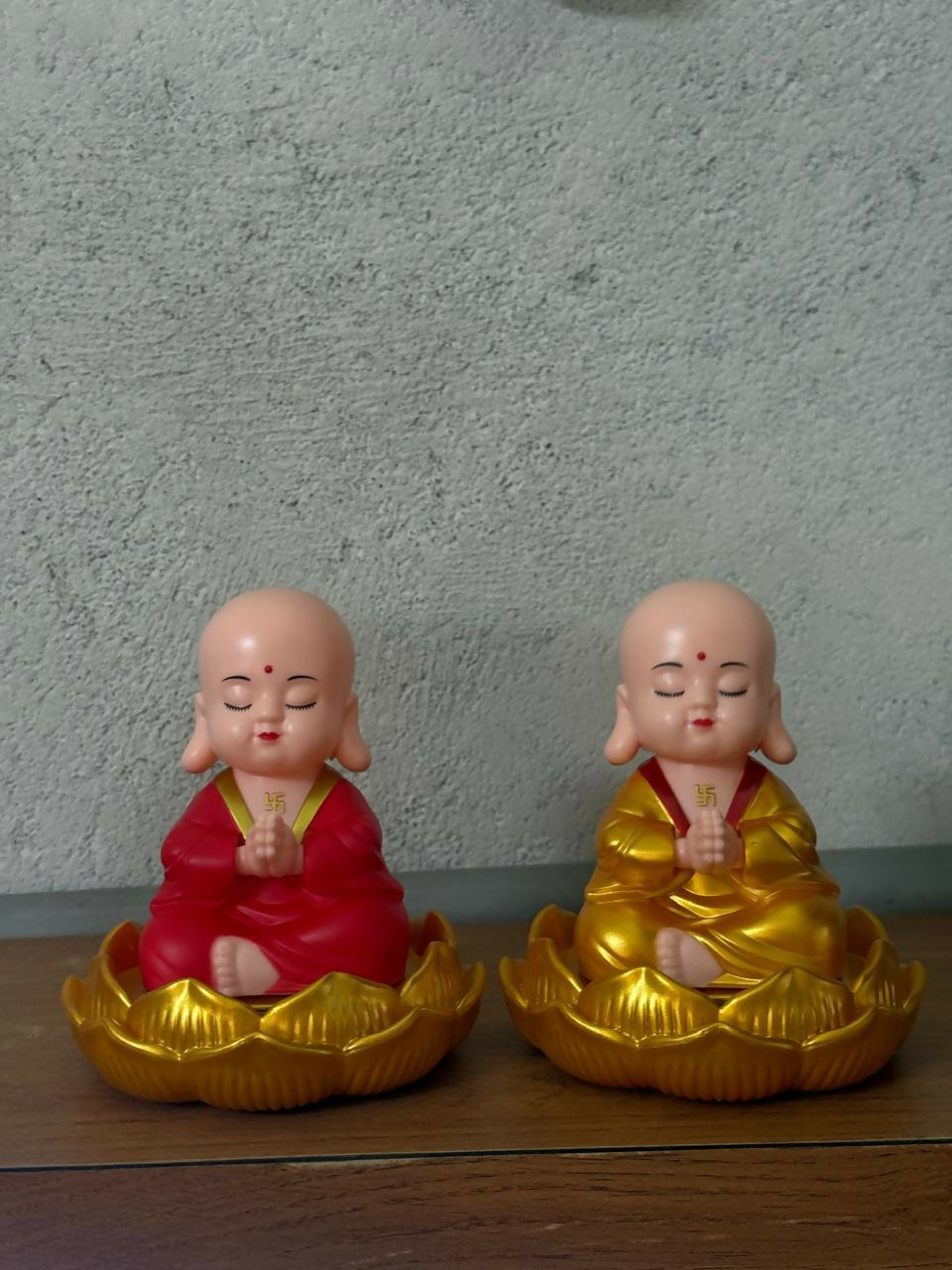 Home decor featuring solar powered monk bobble head