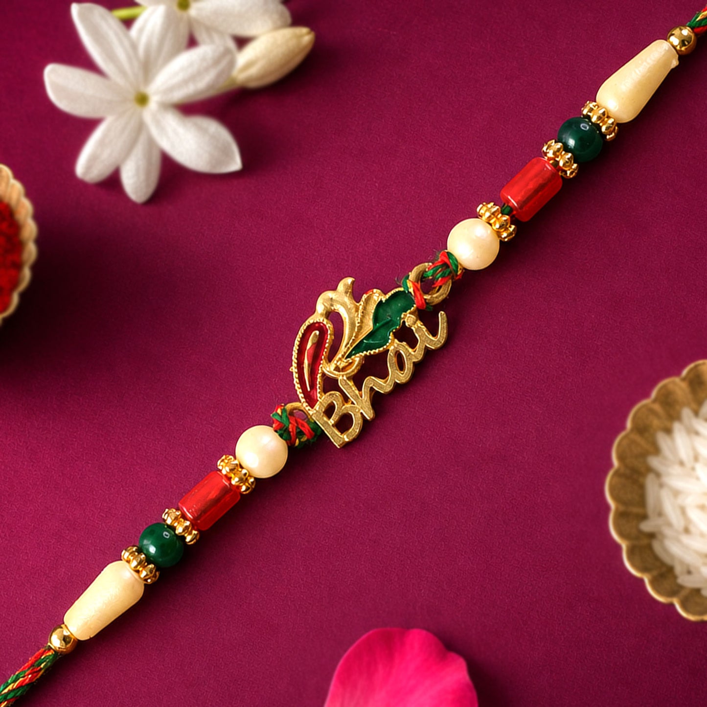 Bold Rakhi showcasing Devanagari Script Charm, bead line and plaque look for Gift Use