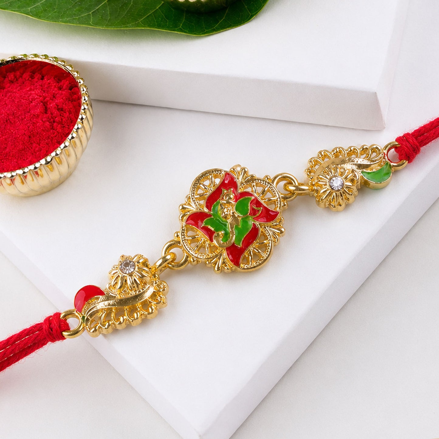 Ornate Rakhi featuring Floral Medallion, multicolor stones and gift style for Gift