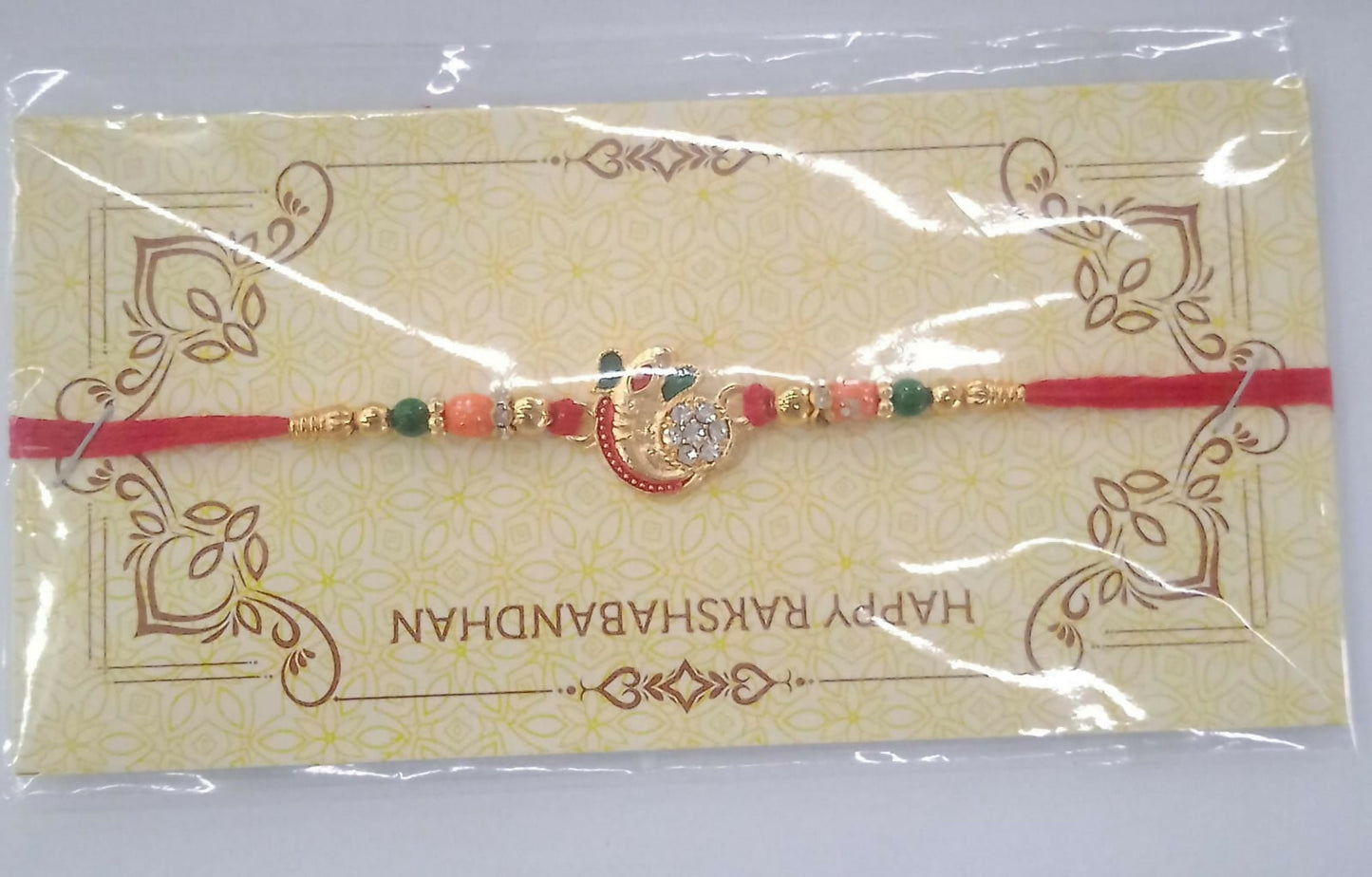 Om Rakhi for Brother Traditional Multicolor Beads on Red Thread (10pcs)