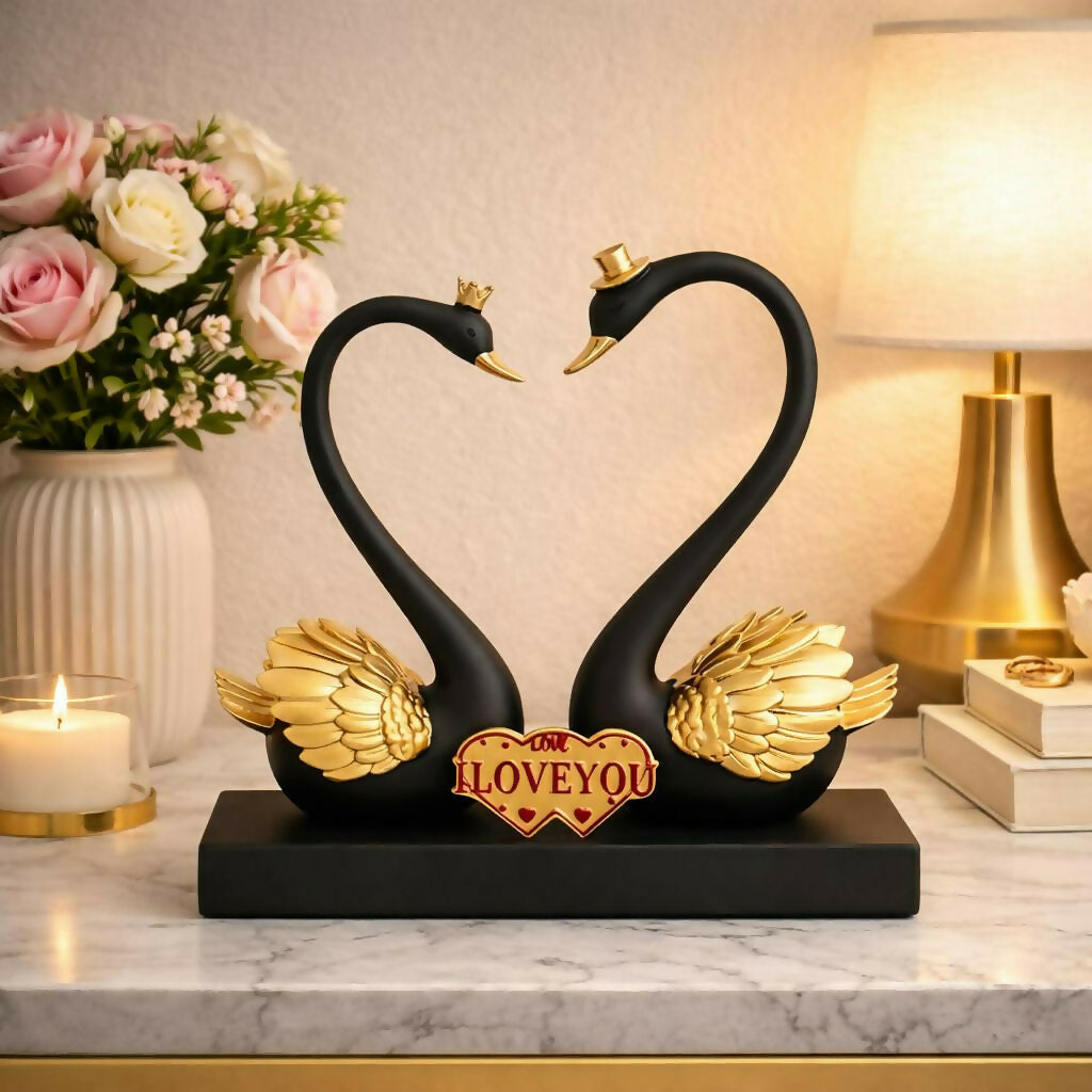 Side view of swan couple showpiece with love plaque