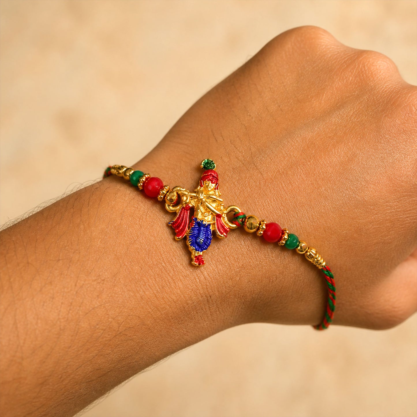 Lord Krishna Flute Pendant Rakhi with Red and Green Beads