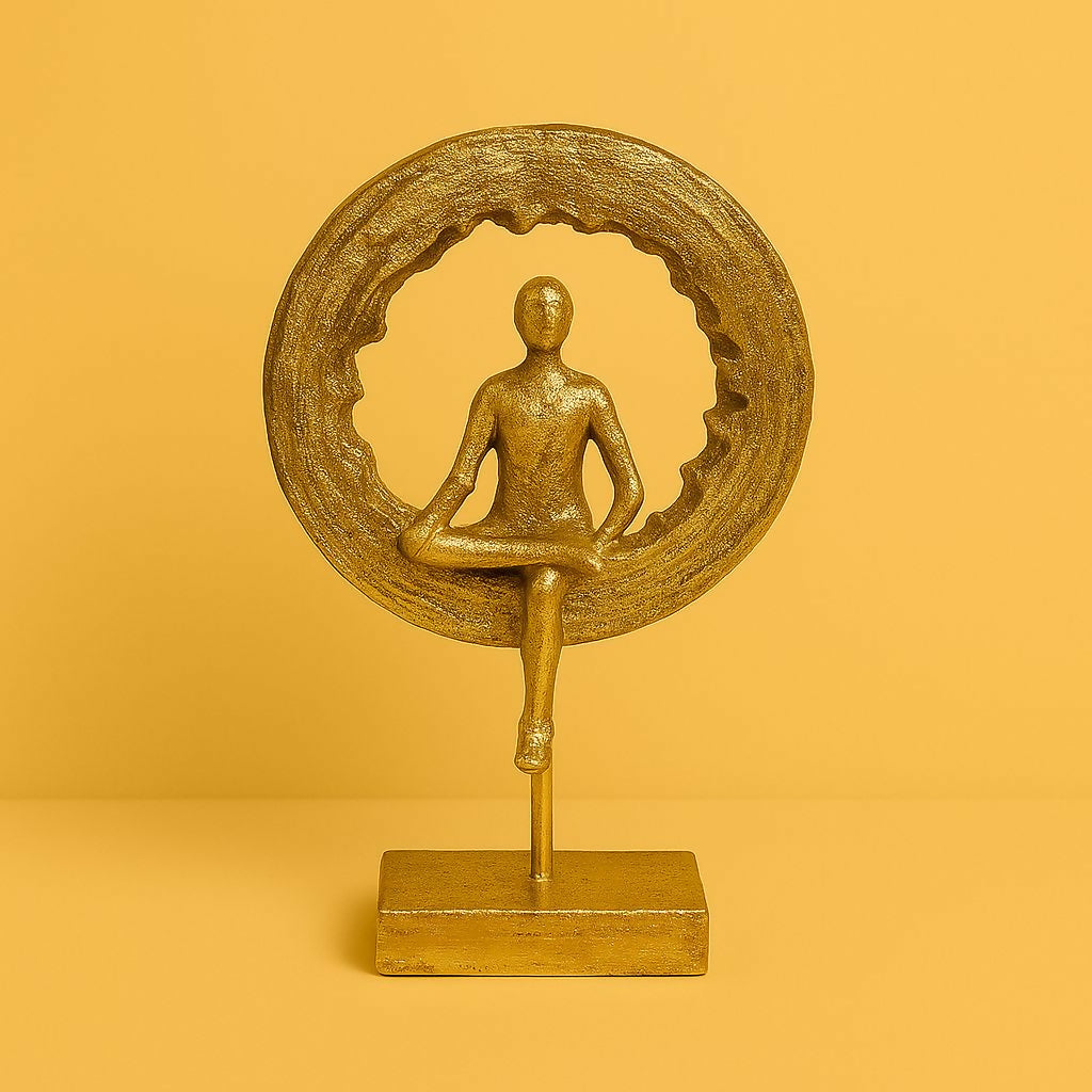 Close-up of golden meditation figurine with premium metallic finish