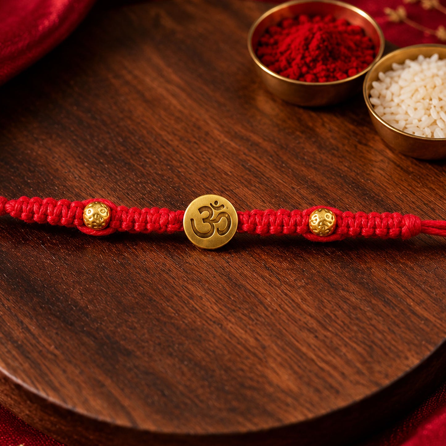 Elegant Stone Work Rakhi with Red Thread, Bead Detailing and Premium Celebration Look